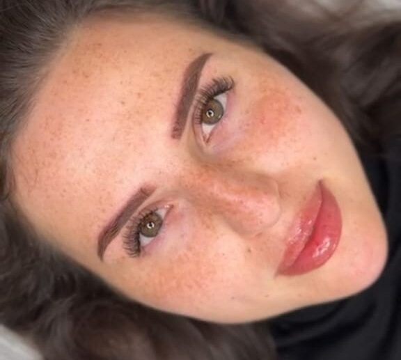 Close-up of lip blush color immediately after session