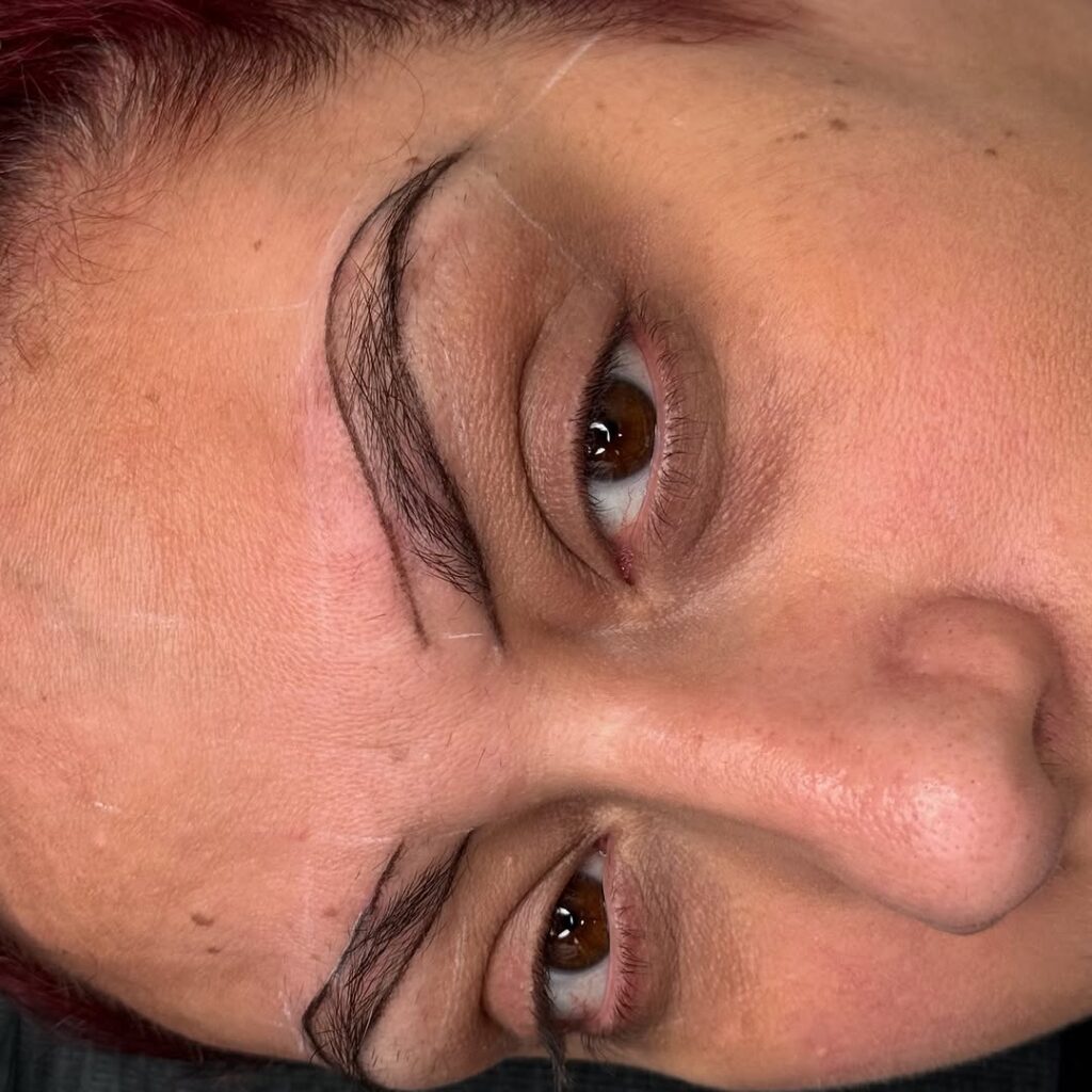 Victoria Studio expert creating delicate nano brows for flawless results.